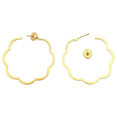 chanel camellia hoop earrings.